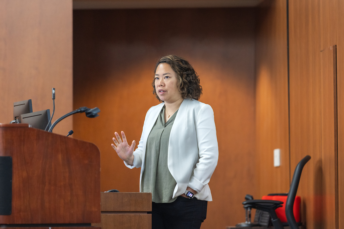 Photo of Dr. Janice Chen giving keynote speech.
