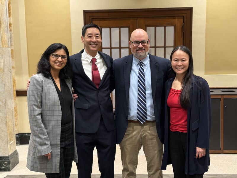 Cap Times Idea Fest panelists (from left to right) Pallavi Tiwari, Christoph Lee, Christian Capitini and Irene Ong with their arms around each other following a successful panel session