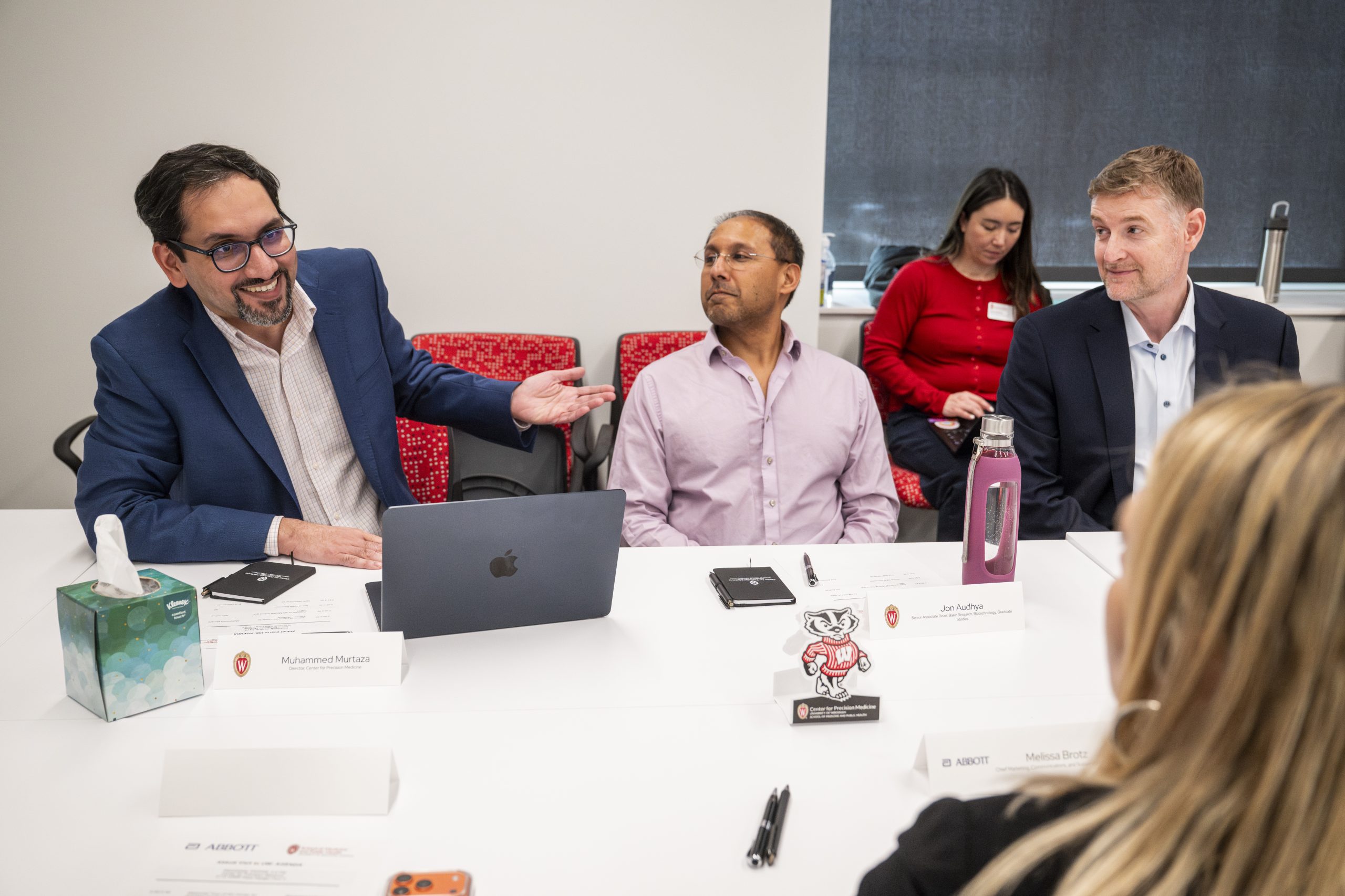 Muhammed Murtaza, Director for Center for Precision Medicine and associate professor in the Department of Surgery talks to representatives from Abbott and the School of Medicine and Public Health Institutes for Medical Research (WIMR) in a round table discussion on March 4, 2026. 