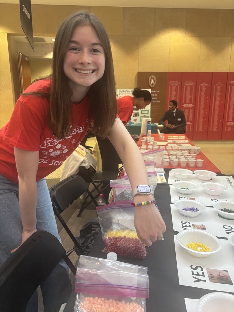 Maryn shows off her DNA bracelet. 
